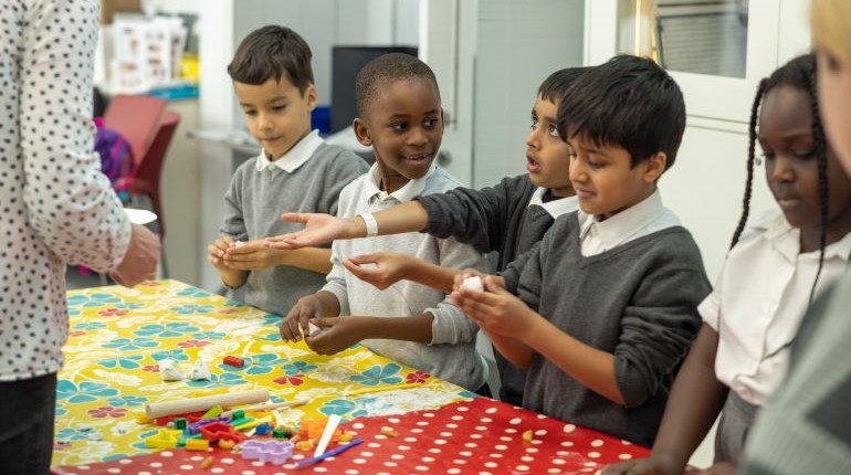 Students enjoying a Biscuit Sensory workshop at The MERL