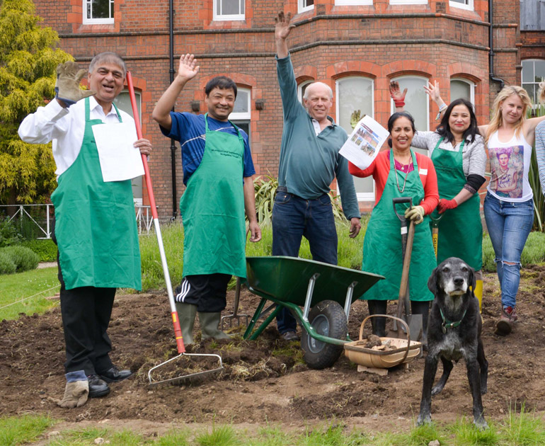An image of members of the Nepalese community in the MERL garden.